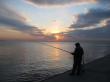 Закат с рыбаком